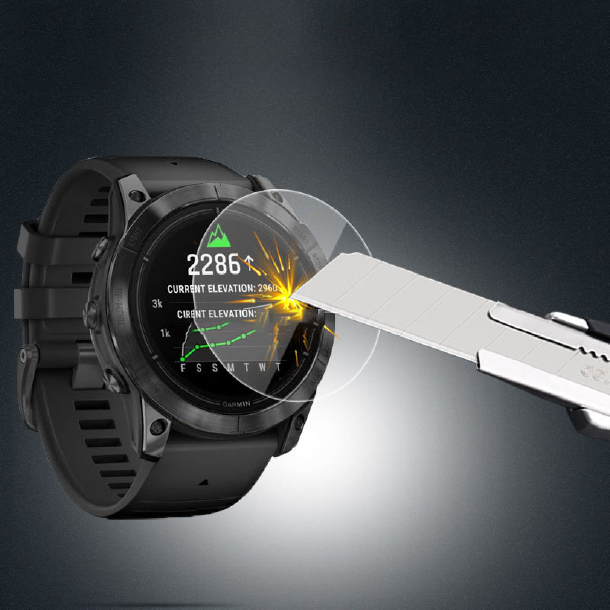 Schwarze Garmin-Uhr mit Bildschirm, der Höhenmeterdaten anzeigt, die mit einem Messer abgekratzt werden.