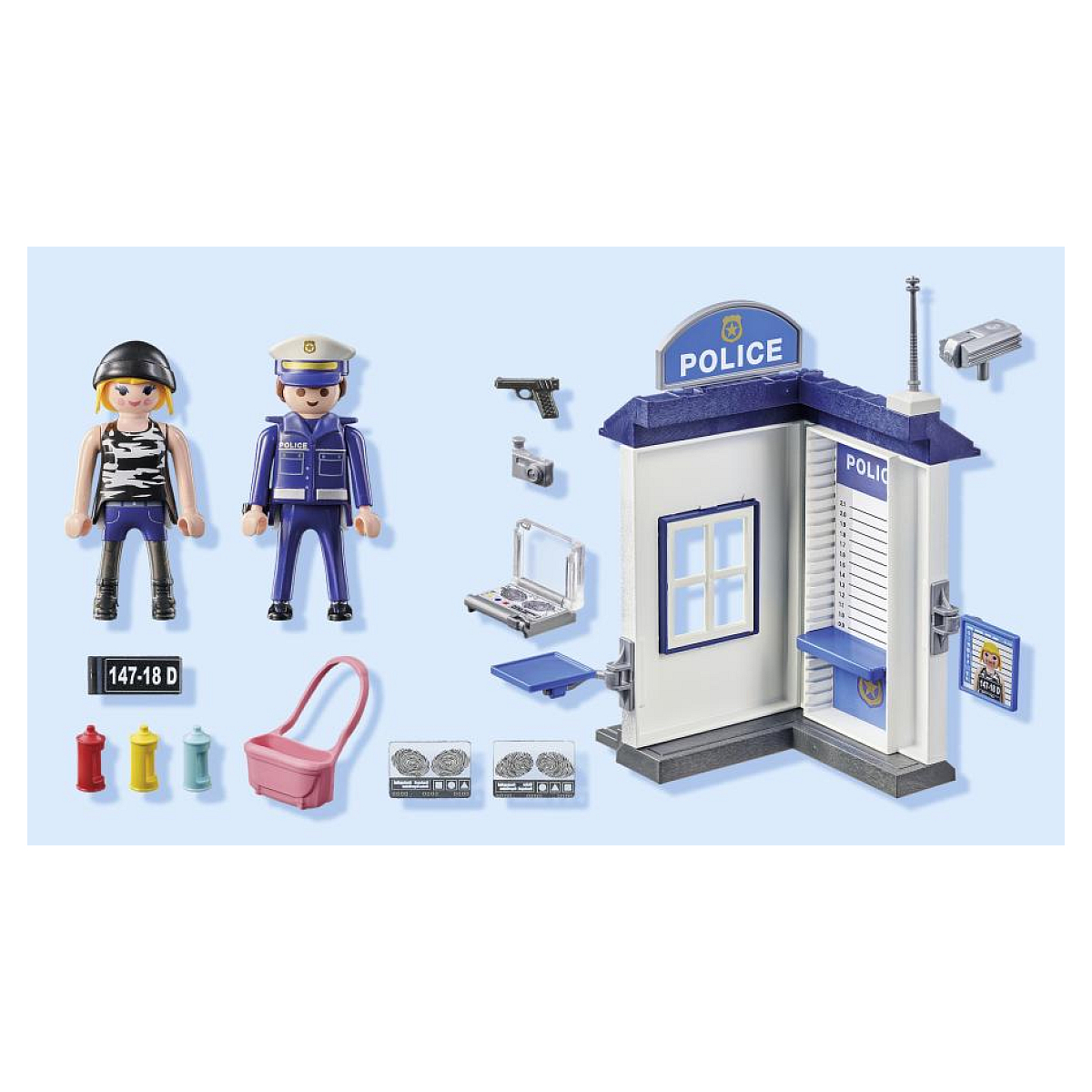 Zestaw posterunku policji Playmobil z figurkami i akcesoriami. Białe tło.