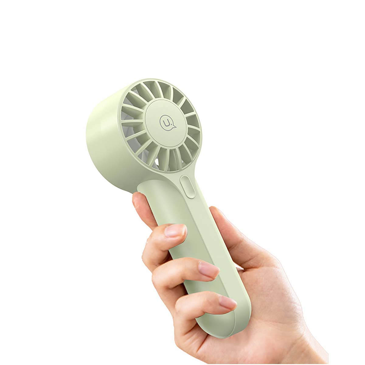 Mano que sostiene un mini ventilador de mano de color verde claro con un cabezal de ventilador circular.