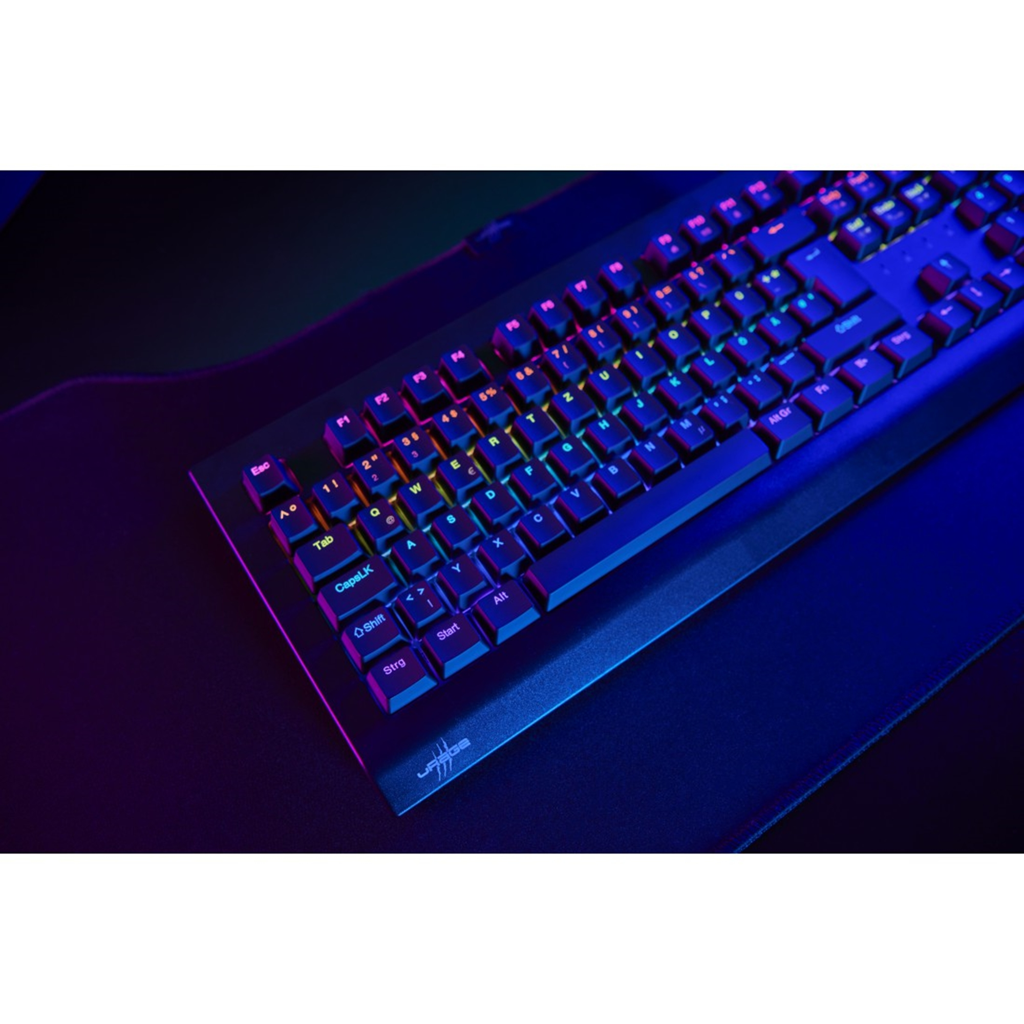 Schwarze Tastatur mit Regenbogen-Hintergrundbeleuchtung auf dunkler Oberfläche.