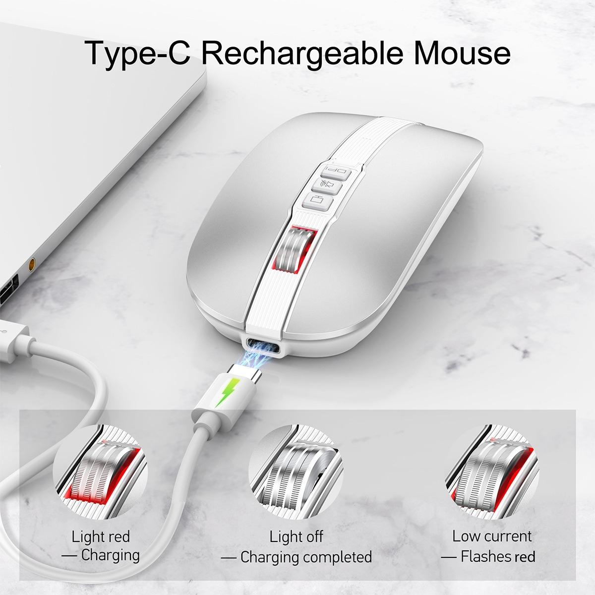 Eine silberne Maus, die mit einem weißen Kabel geladen wird. Das Ladelicht zeigt die Zustände rot, aus und blinkend rot an.