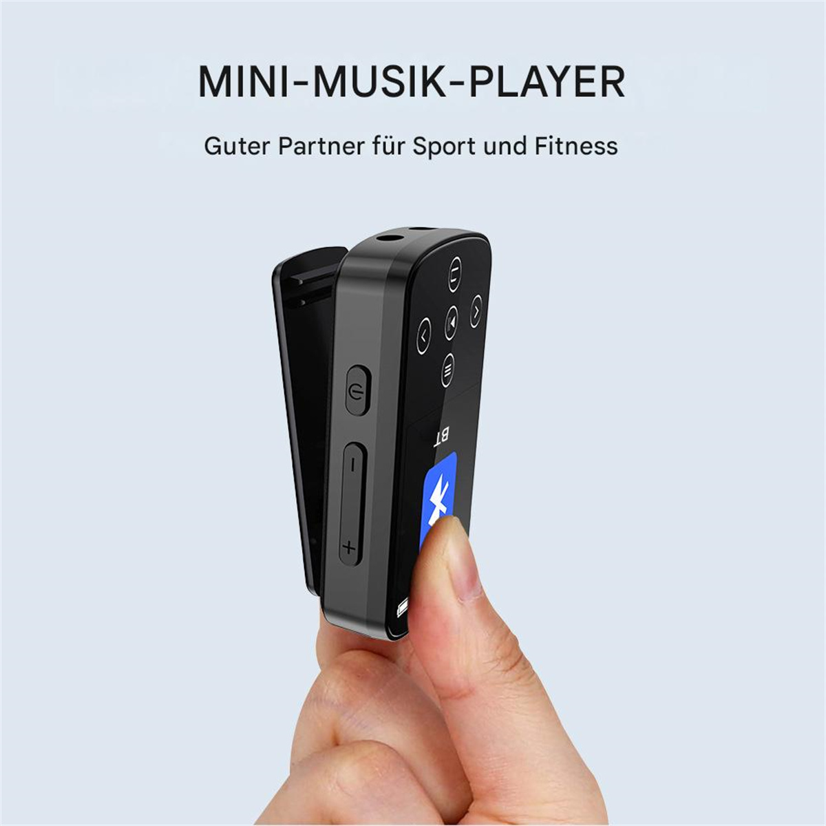 Schwarzer MP3-Player mit Bedienelementen und Clip. Er wird von einer Hand gehalten. Der Text lautet: 'Mini-Musik-Player'