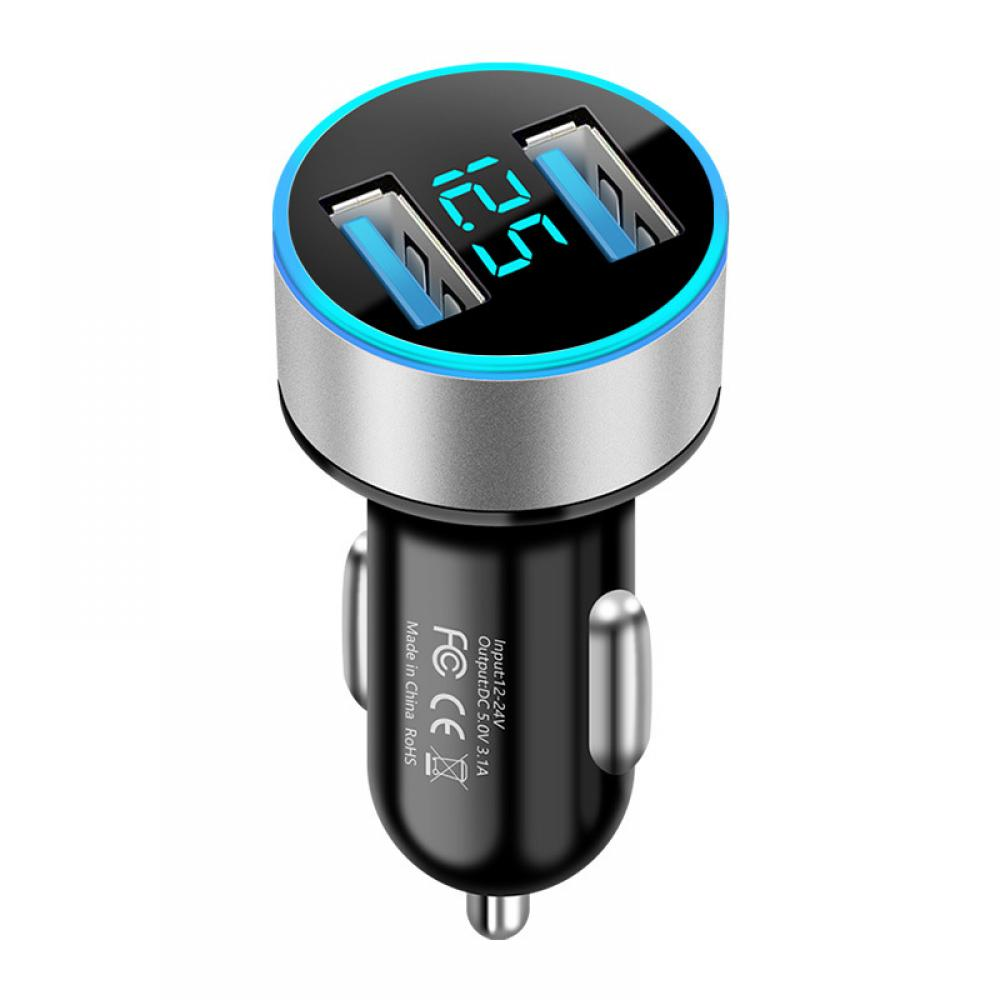 Ein schwarzes und goldenes Autoladegerät mit zwei USB-Anschlüssen und einem Digitaldisplay mit der Anzeige 2.5. Es hat einen blauen Lichtring.