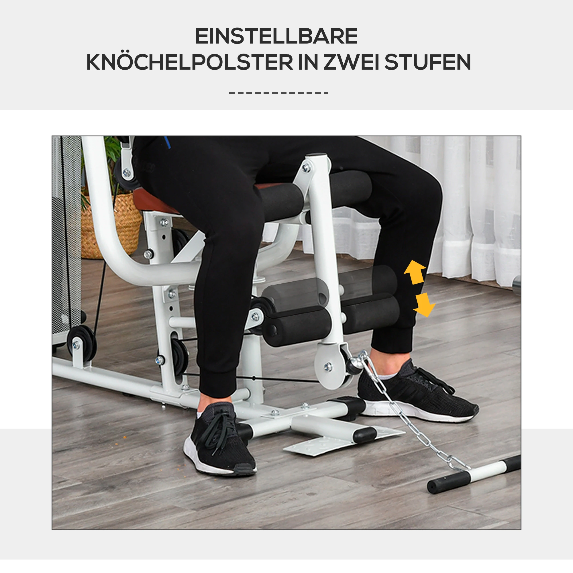 Eine Person benutzt eine Bein-Trainingsmaschine. Die Maschine ist weiß und schwarz mit orangen Pfeilen.