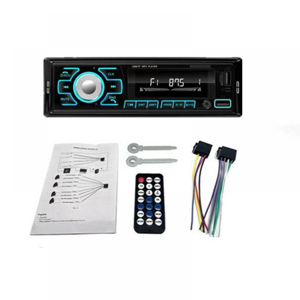 Ein Autoradio mit Knöpfen, Display und Fernbedienung, Kabeln und einer Anleitung.