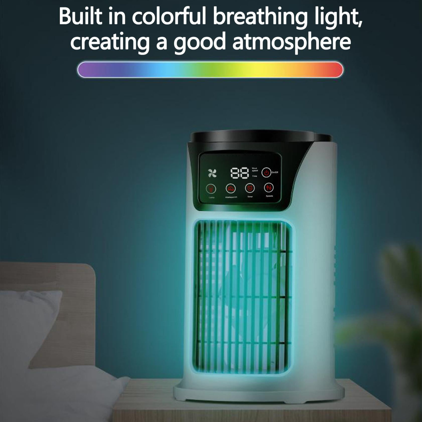 Weiß-schwarzer Luftkühler leuchtet blau. Bunte Lichtleiste oben. Schlafzimmer mit Bett sichtbar.