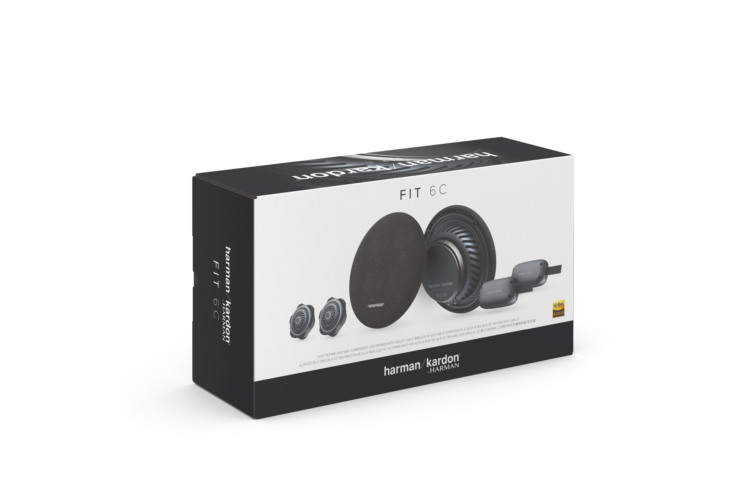 Eine Lautsprecherbox mit Harman Kardon-Branding, enthält Lautsprecher und Kabel, auf weißer Oberfläche.