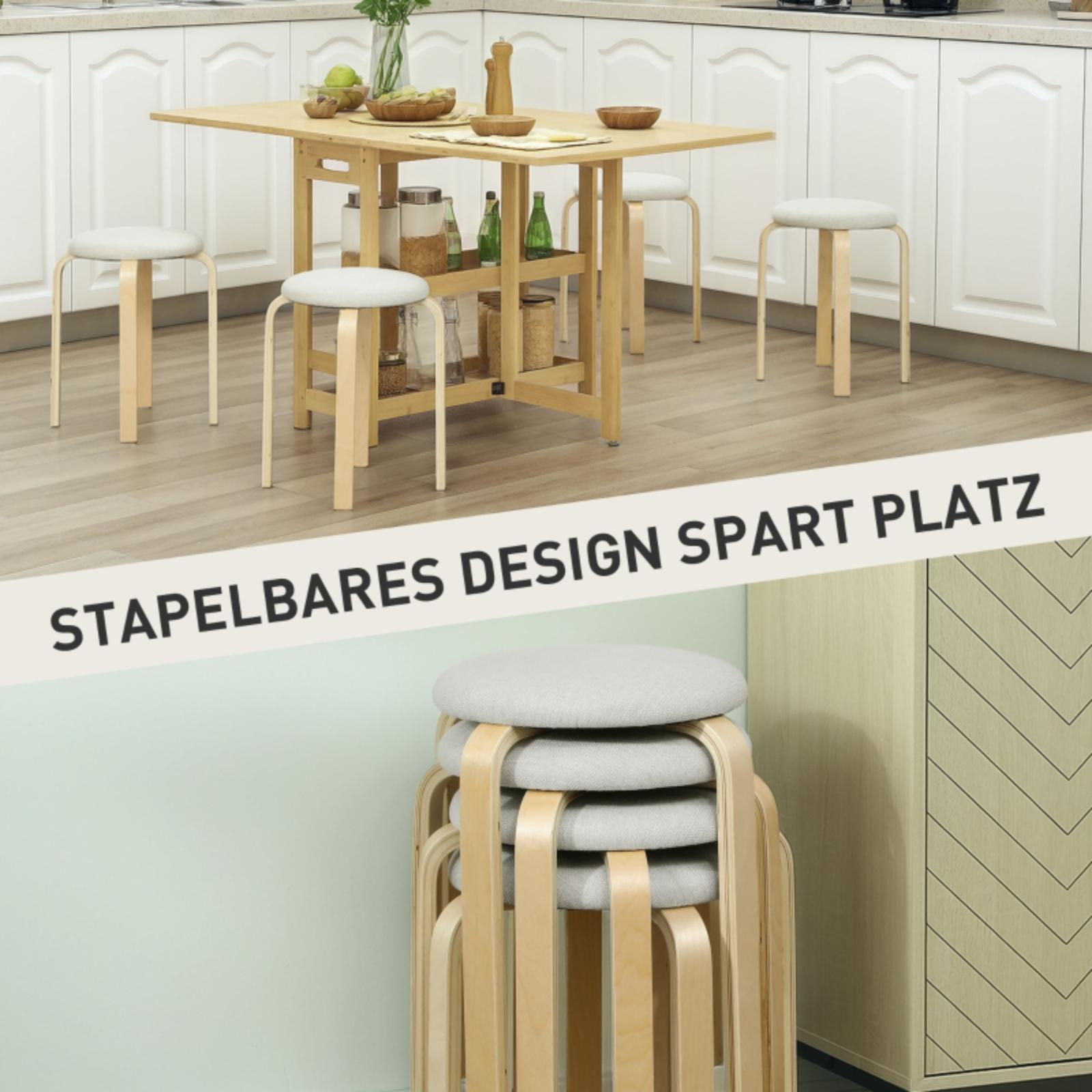 Küchenumgebung mit Klapptisch und Hockern. Hocker sind gestapelt, um Platz zu sparen. Text: 'Stapelbares Design spart Platz'.