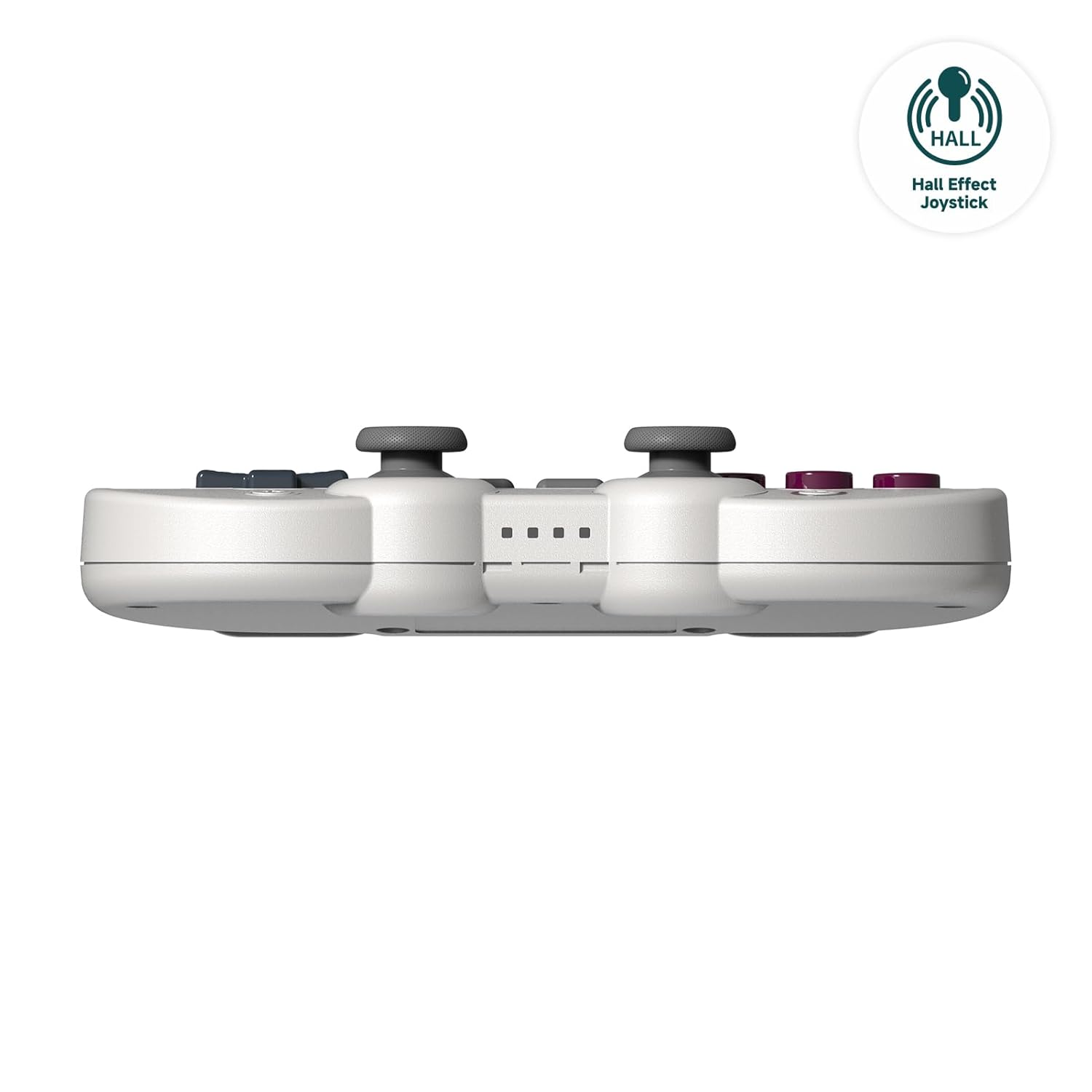 Widok z boku białego gamepada pokazujący przyciski. Na górze znajduje się etykieta Hall Effect Joystick.