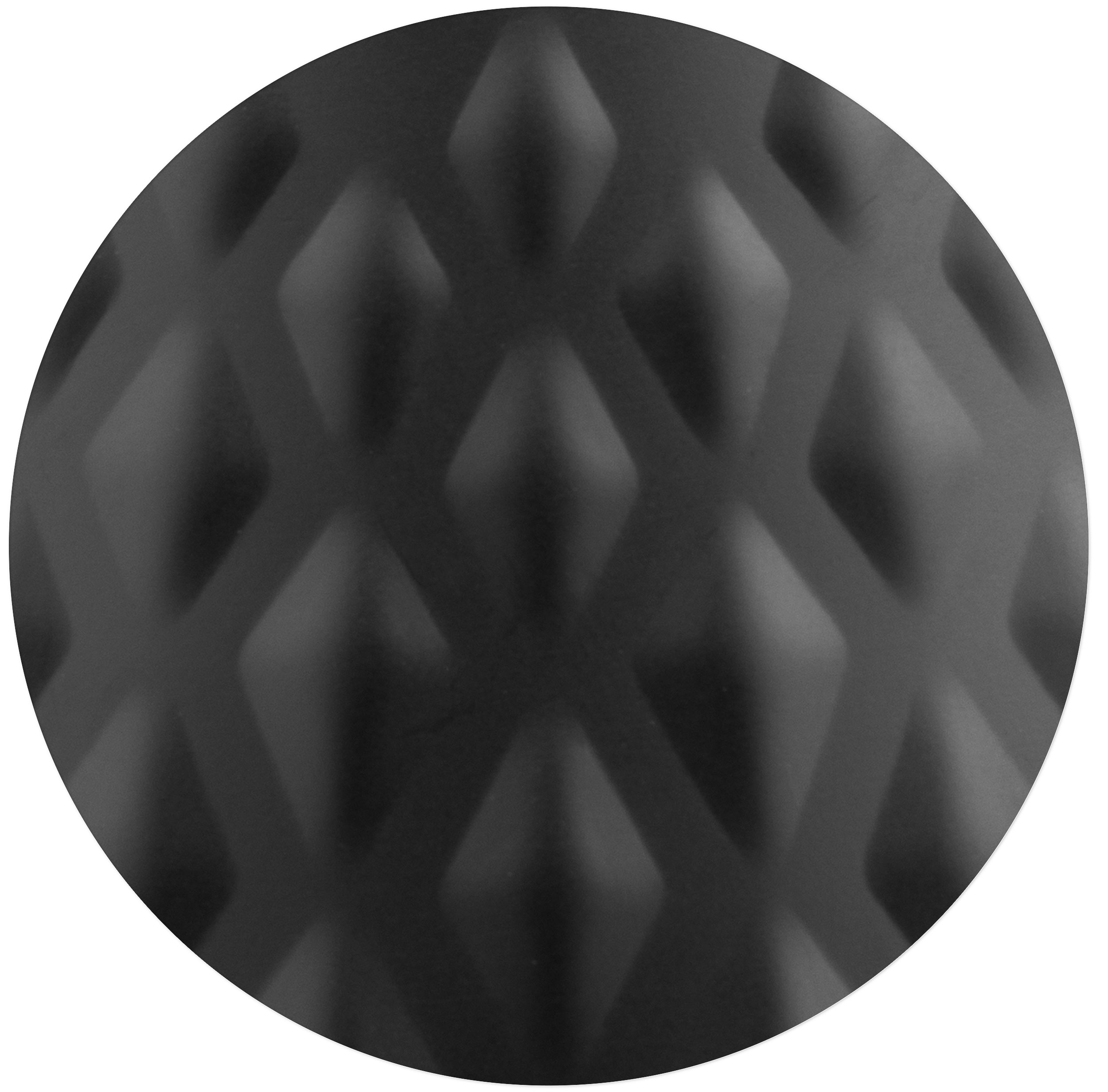 Zbliżenie czarnej powierzchni w romby, tworzące fakturę w okręgu.