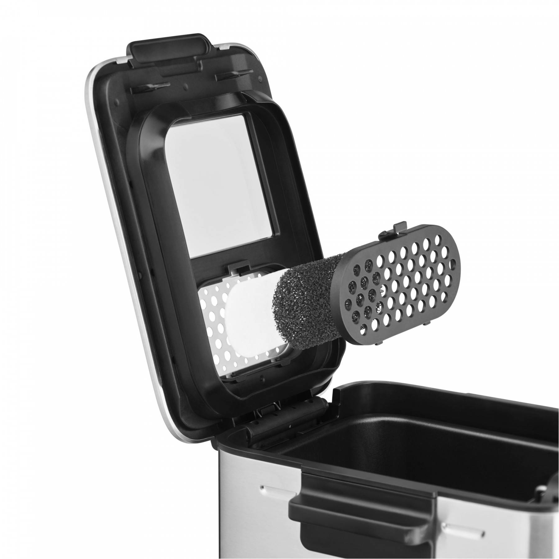 Elementy frytownicy powietrznej: filtr i odłączany element z uchwytem.