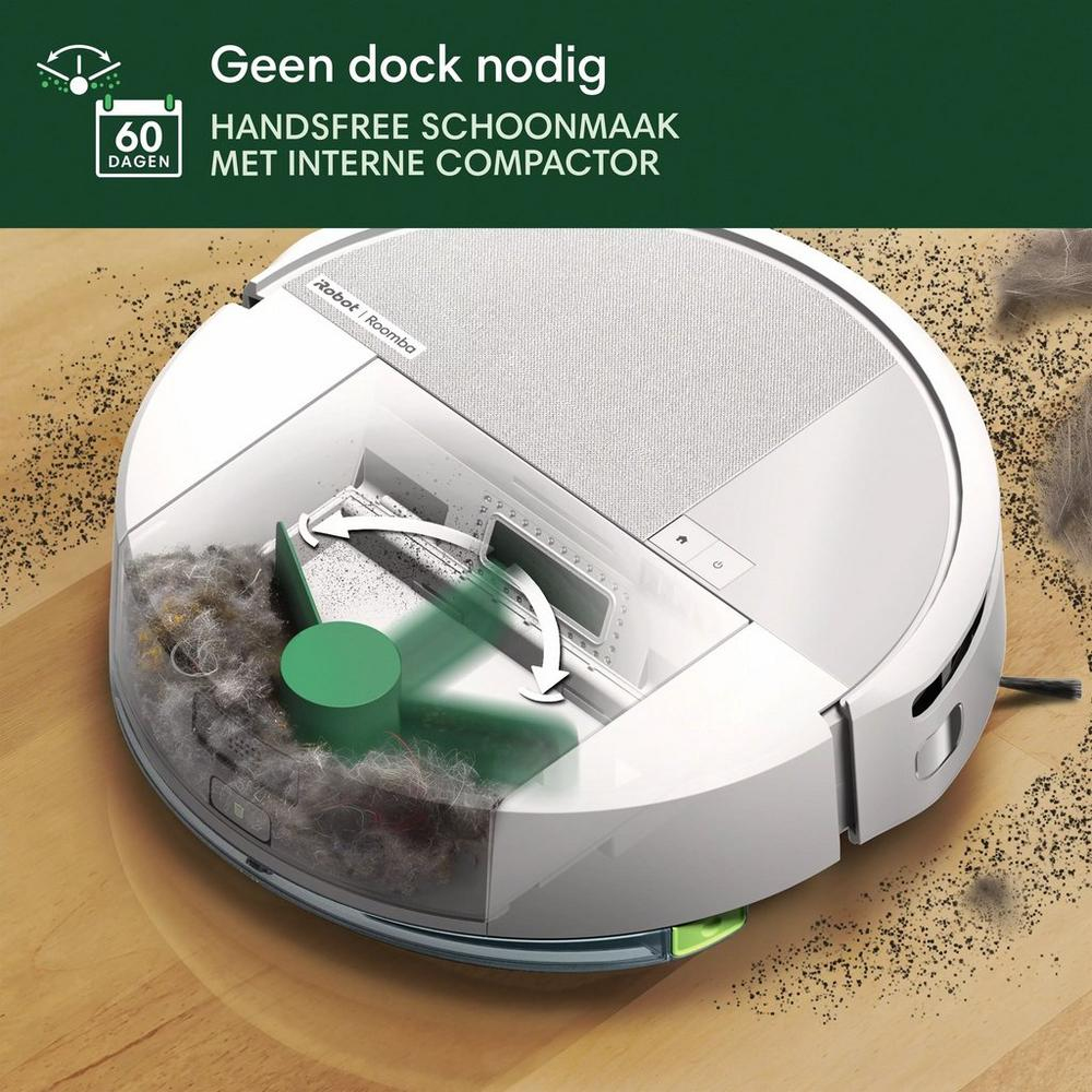 Biały odkurzacz Roomba na drewnie. Ma przezroczysty pojemnik na kurz wypełniony zanieczyszczeniami. Tekst mówi: 'Czyszczenie bez użycia rąk'.