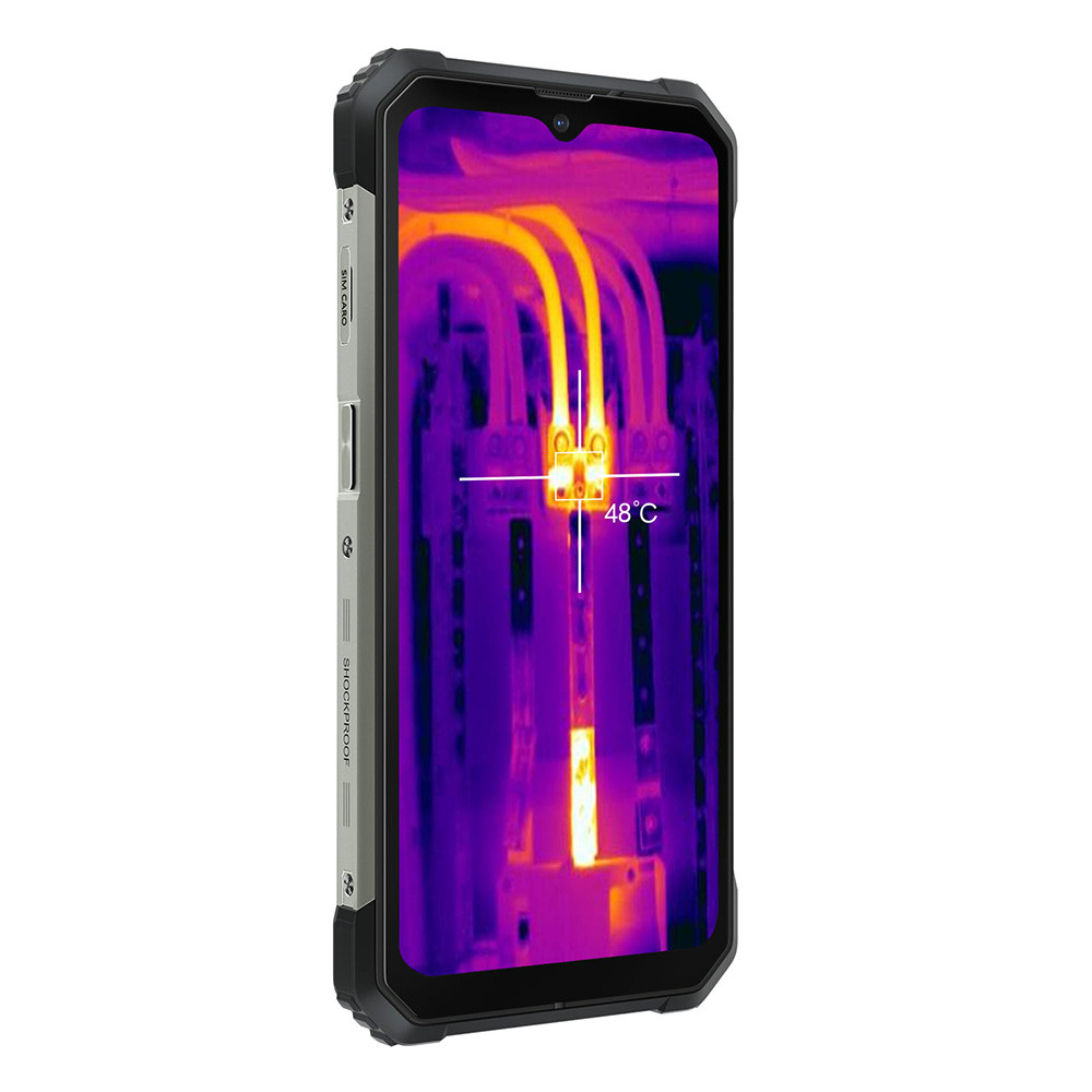 Uno smartphone robusto mostra un'immagine termica di circuiti a 48°C. Il telefono ha una cornice nera ed è antiurto.