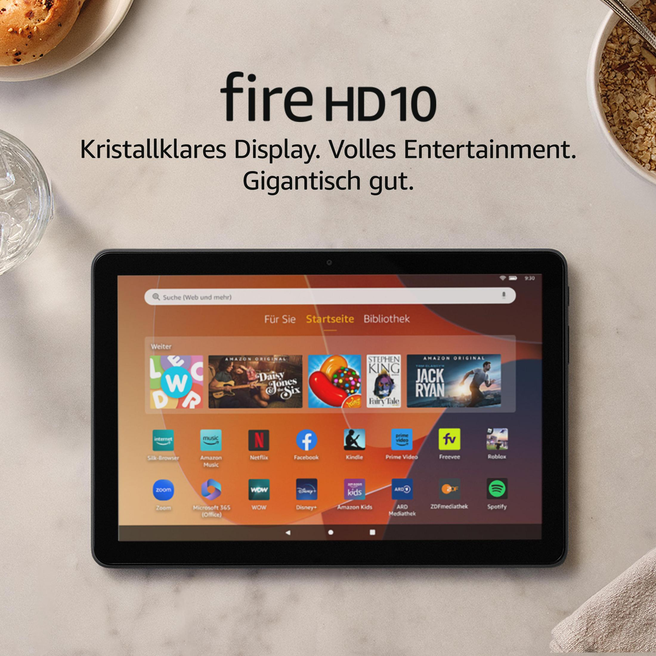 Un tablet nero mostra app. Il testo dice 'fire HD 10'. Il cibo è sullo sfondo.