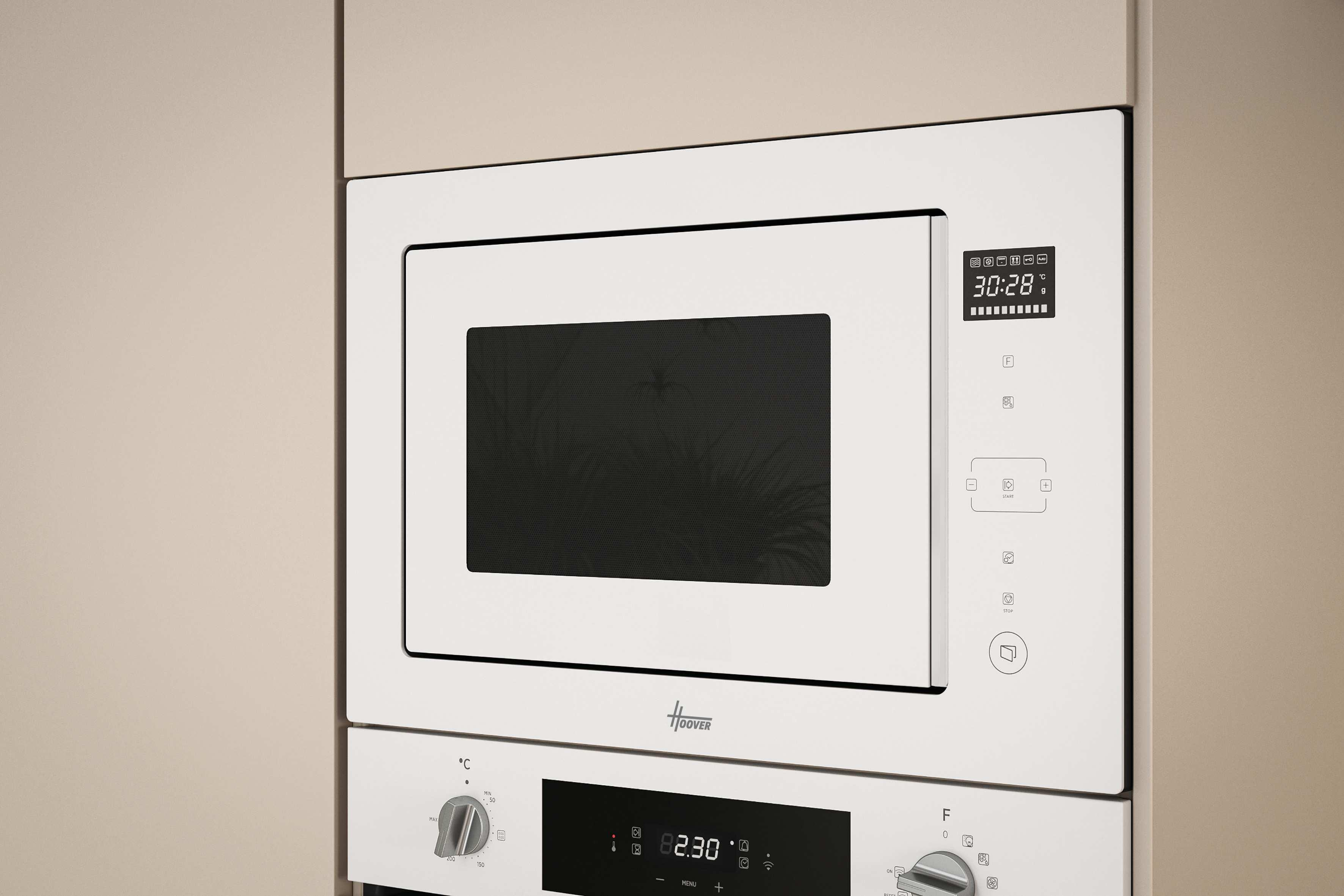 Biała kuchenka mikrofalowa z cyfrowym zegarem pokazującym 30:28. Poniżej panel sterowania z przyciskami i wyświetlaczem.