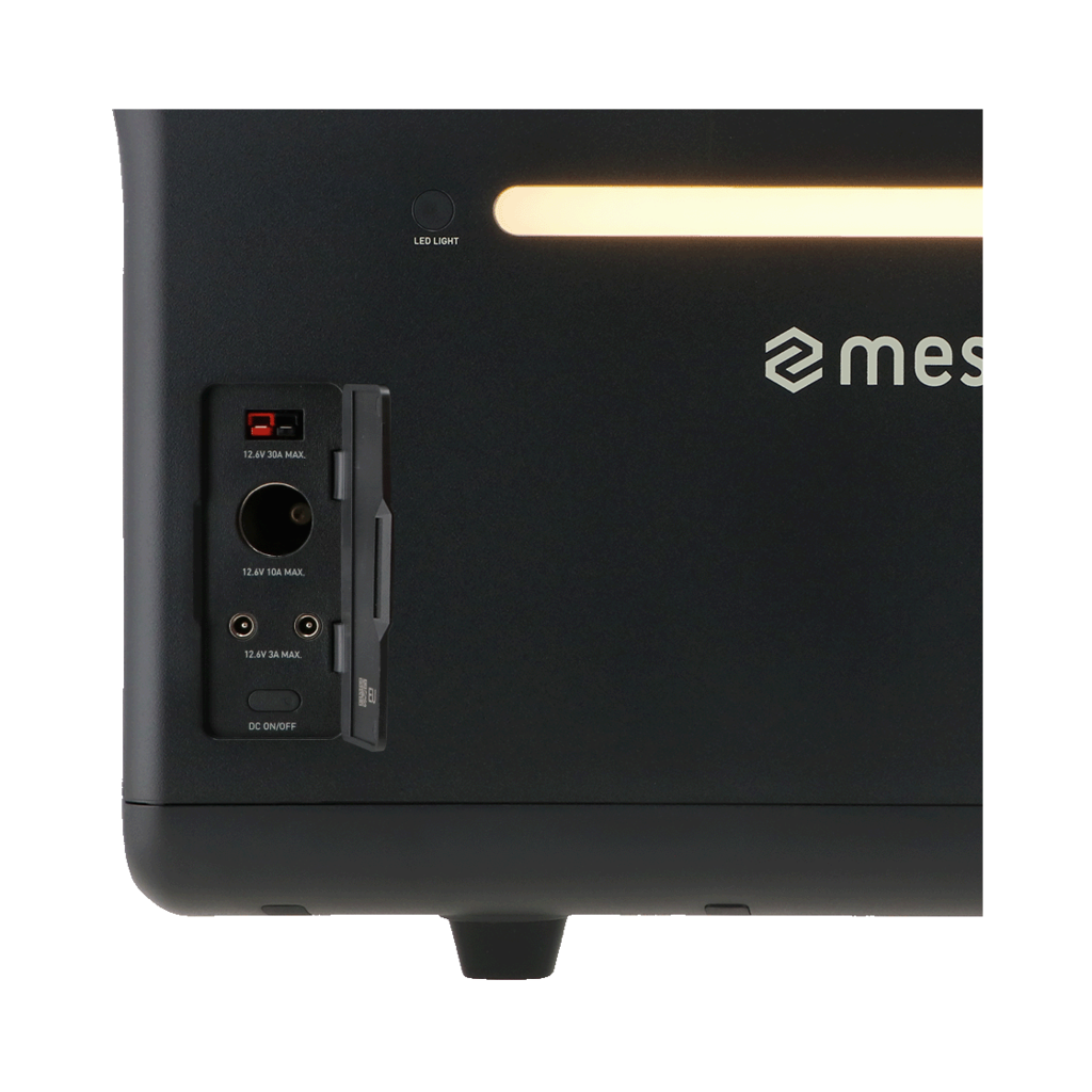 Black device with ports, LED light, and brand logo. Ports include power and DC on/off. Light bar at the top.