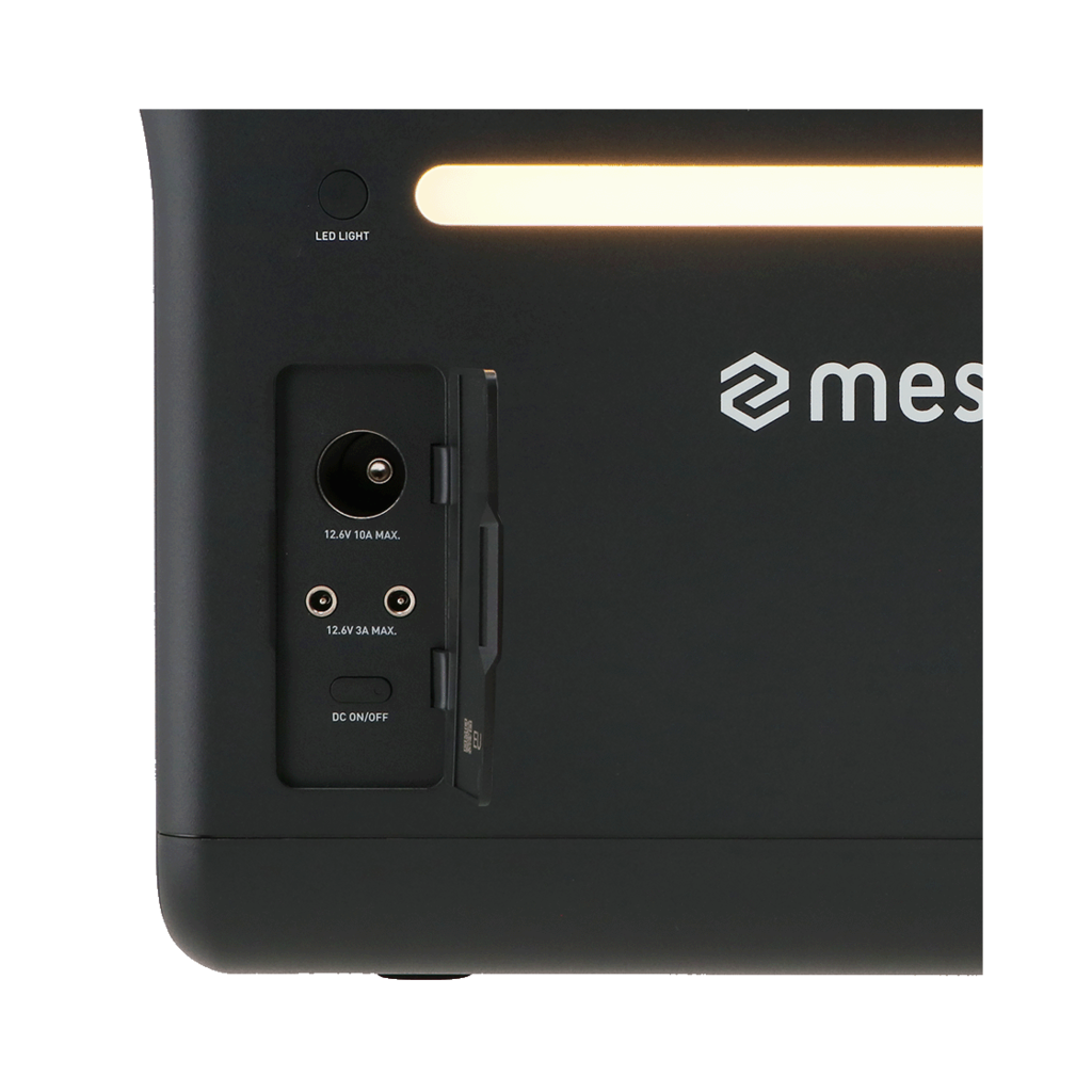 Black device with ports, glowing bar and logo. Shows ports for power and a light labeled 'LED LIGHT'.