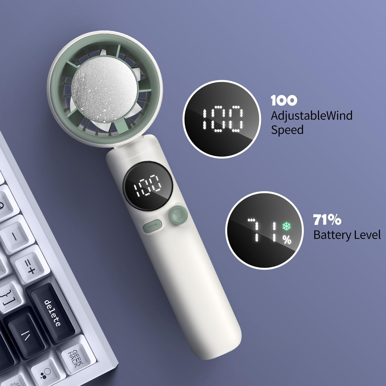 Ein weiß-grüner tragbarer Ventilator mit LCD-Anzeige, die 100 und 71% zeigt. Eine Tastatur ist unten links sichtbar.