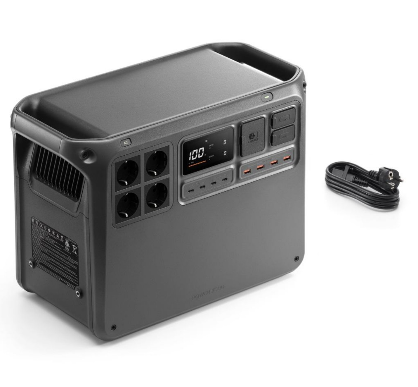 Graue Powerstation mit mehreren Steckdosen, Digitalanzeige mit 100, und ein gewickeltes schwarzes Netzkabel rechts.