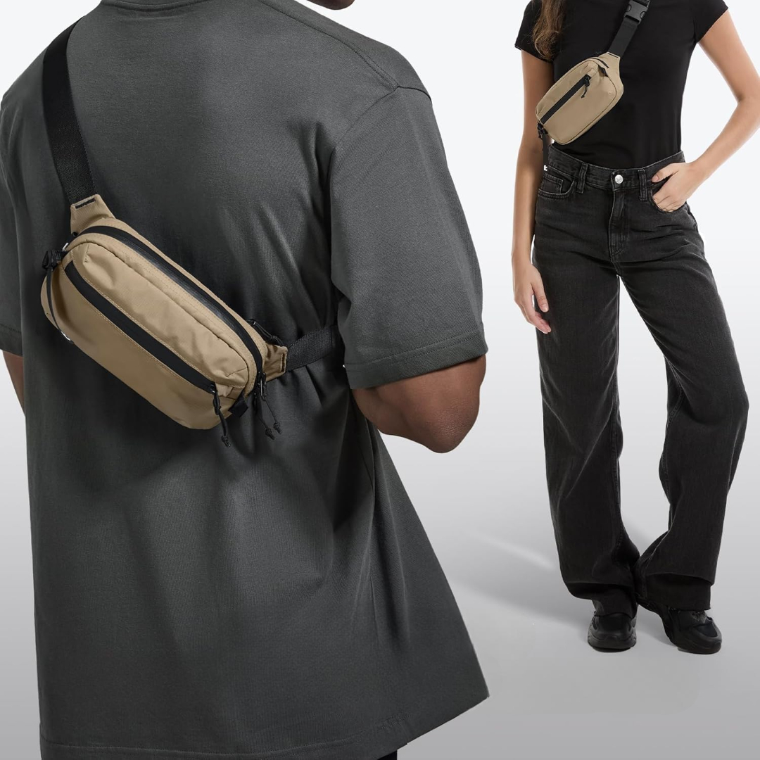 Dwie osoby noszące nerki. Mężczyzna w szarej koszulce, kobieta w czarnej koszulce i dżinsach. Oboje noszą torby w kolorze tan z czarnymi paskami.