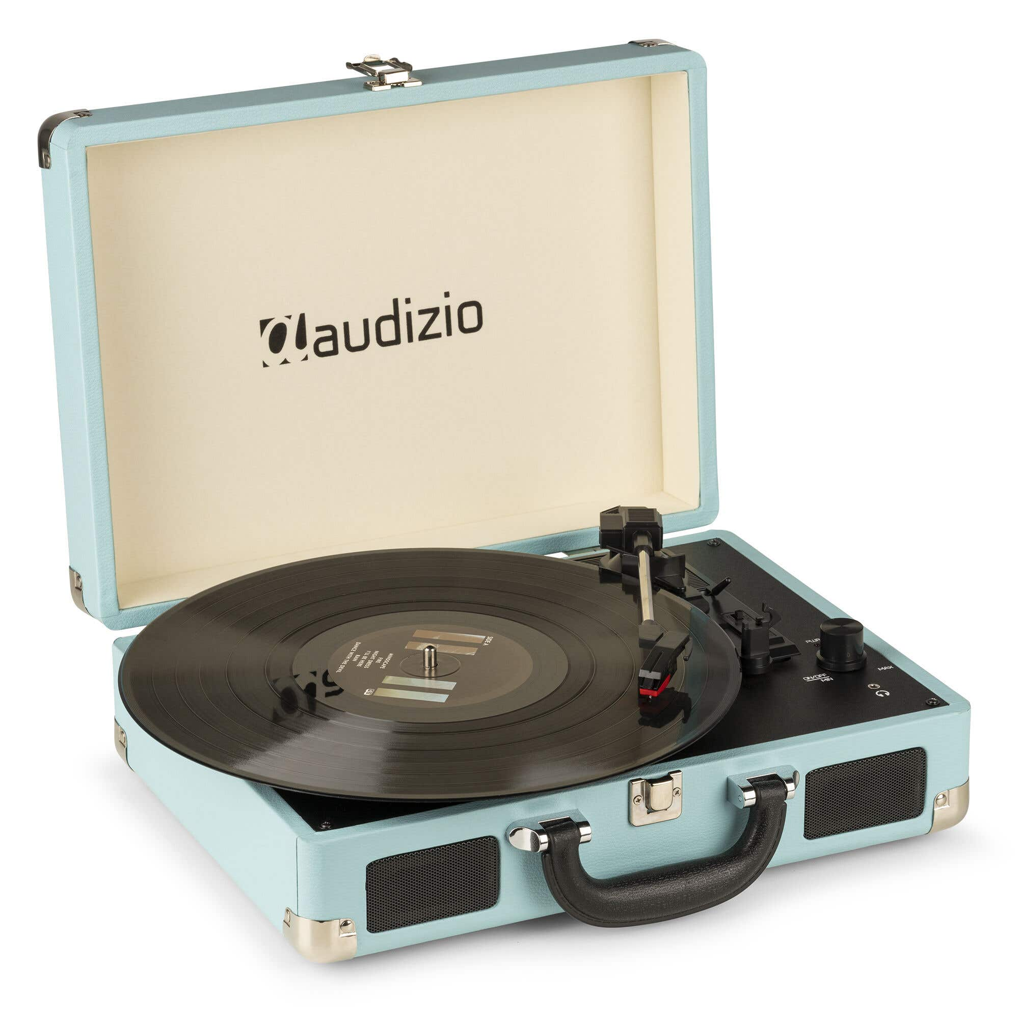 Un tocadiscos Audizio azul claro con un disco negro encima. La tapa está abierta. Se ven el asa negra y los altavoces.