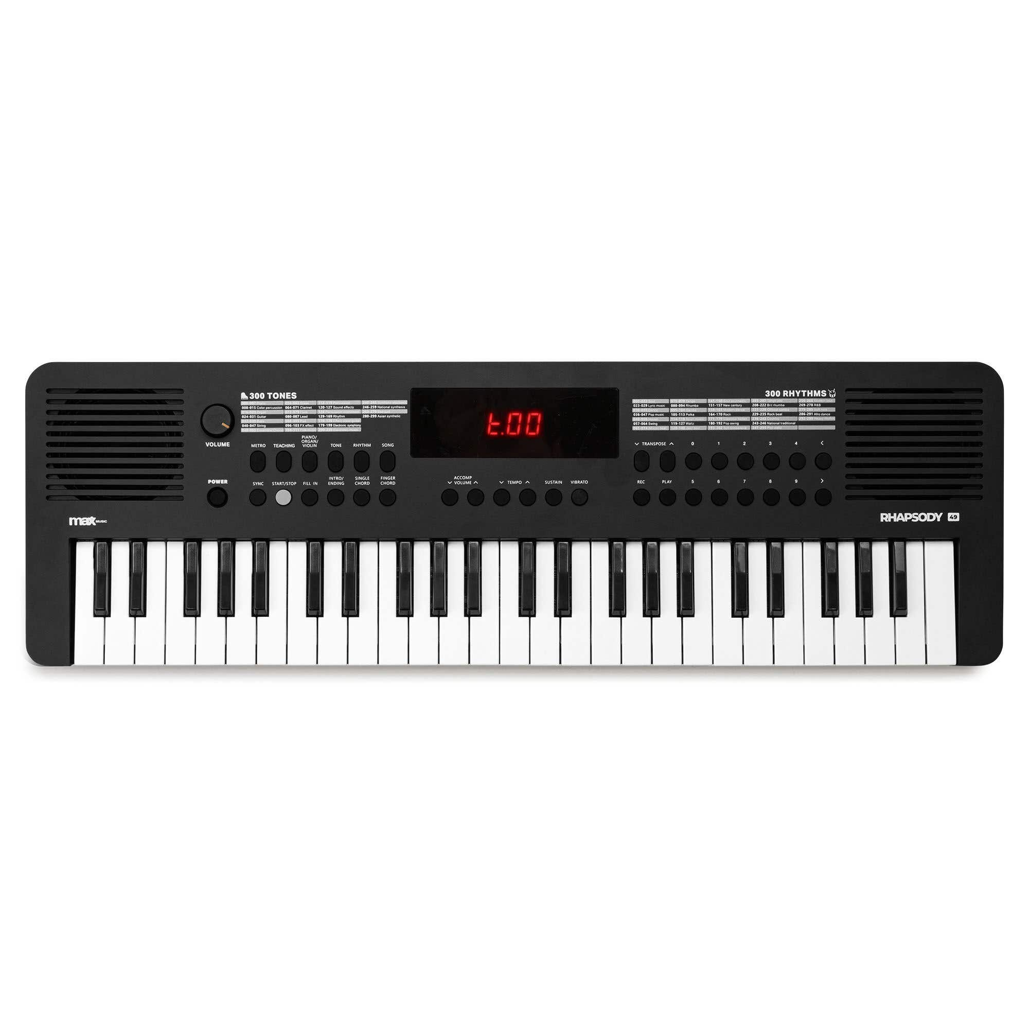 Eine schwarze Tastatur mit weißen Tasten. Es hat Knöpfe, ein Display und den Markennamen 'RHAPSODY'. Enthält 300 Töne und Rhythmen.