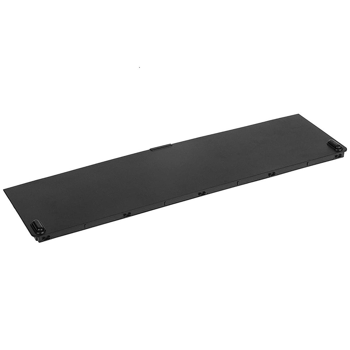 Si vede un oggetto nero e rettangolare, forse una batteria per laptop. Ha angoli arrotondati e piccoli dettagli sui lati.