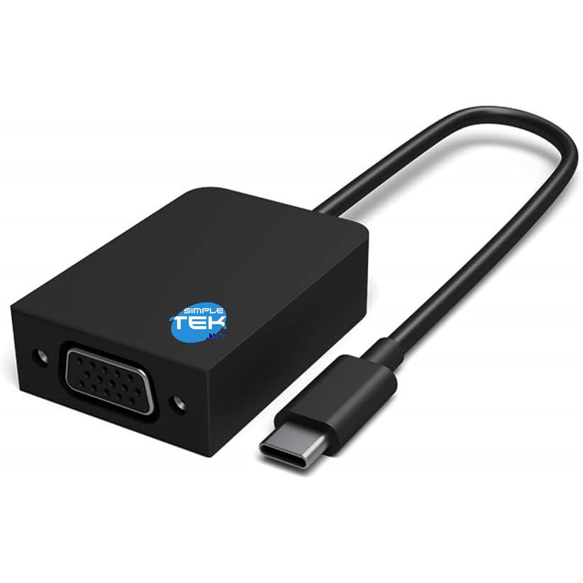 Adattatore nero con porta VGA e connettore USB-C. Il logo "SIMPLE TEK" è sull'adattatore. Il cavo collega le due parti.