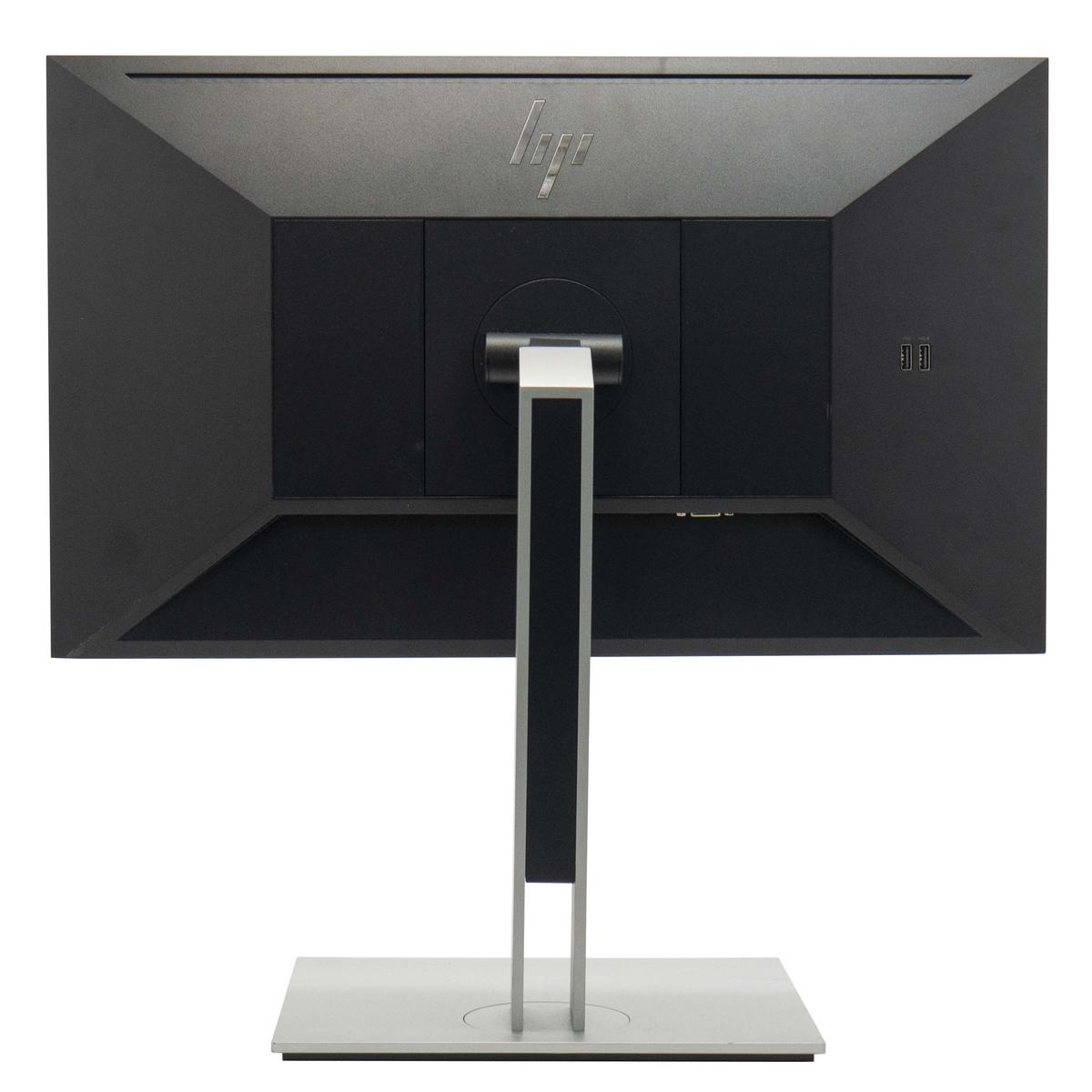 Back view of a black computer monitor. It has a silver stand and the HP logo at the top.
