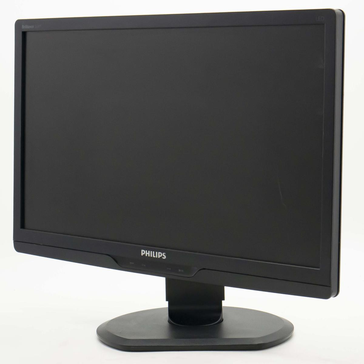 Un monitor per computer Philips nero è centrato. Si trova su un supporto nero. Lo sfondo è bianco.