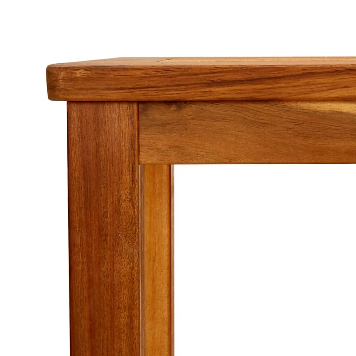 Nahaufnahme einer Holztischecke. Das Holz ist braun mit sichtbarer Maserung. Der Hintergrund ist weiß.