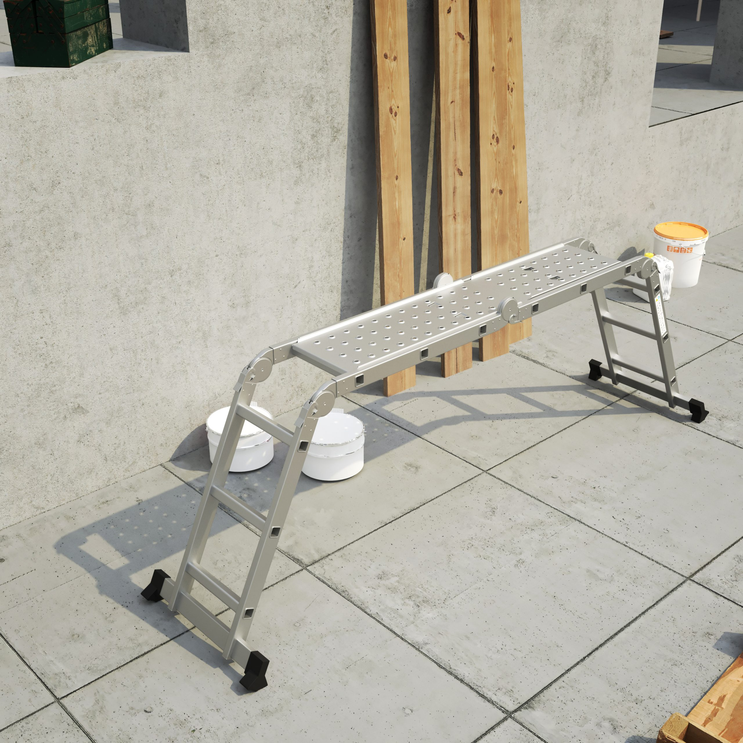 Une échelle plateforme en métal est installée sur une surface en béton. Des planches de bois sont appuyées contre un mur. Des seaux de peinture sont à proximité.