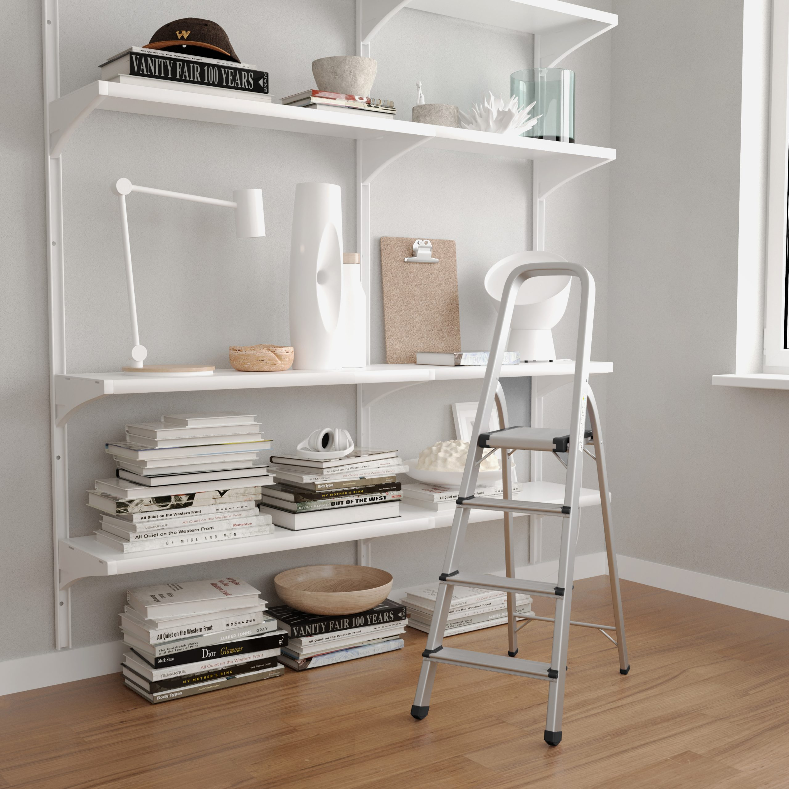 A room with shelves of books and decor. A step ladder stands nearby. Wooden floors.