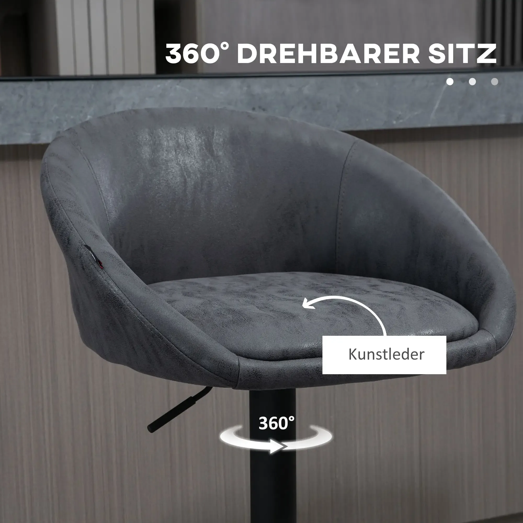 Grauer Drehstuhl mit 360-Grad-Drehfunktion. Der Sitz besteht aus Kunstleder und das Gestell ist schwarz.