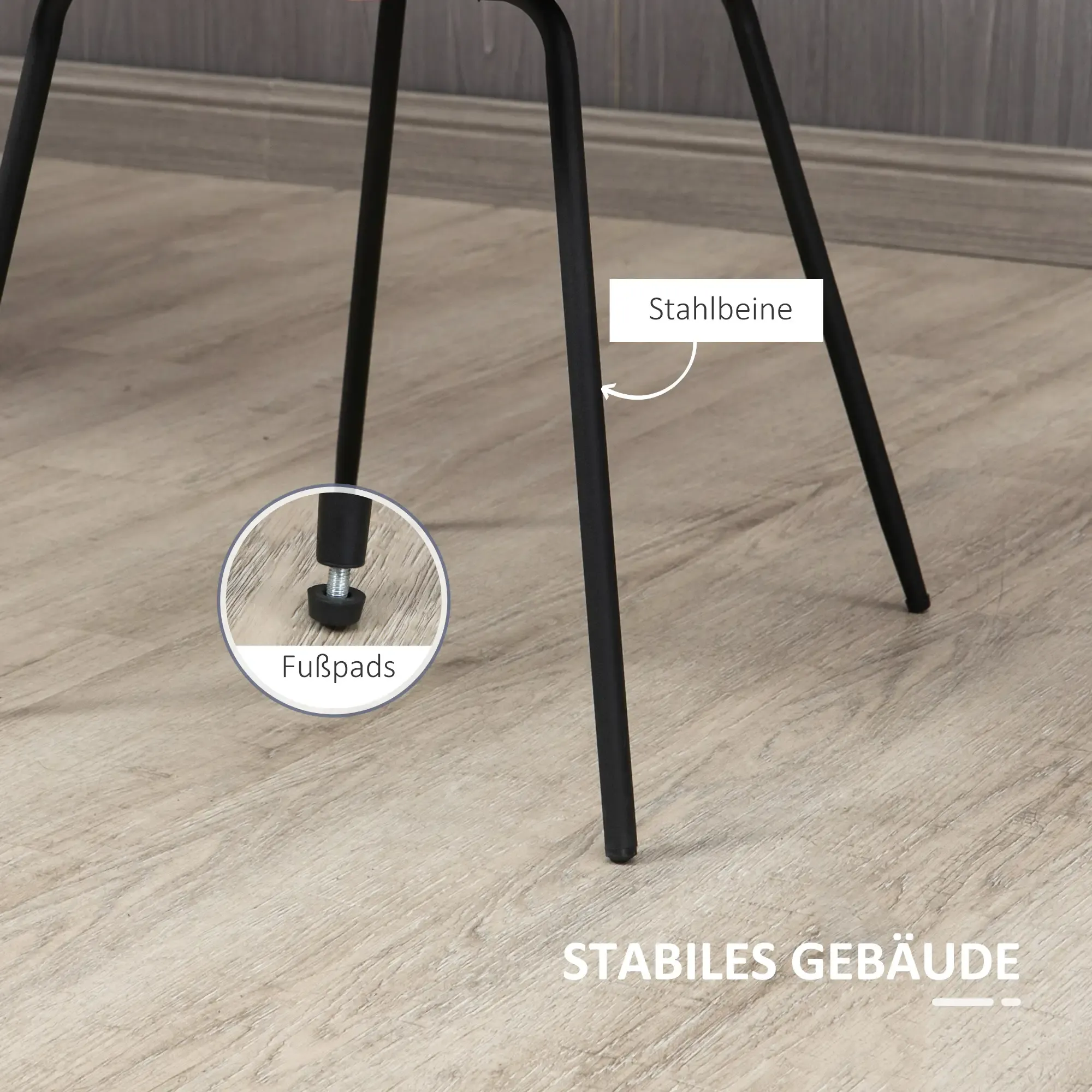 Nahaufnahme eines Stuhlbeins mit Stahlbeinen und verstellbaren Fußpolstern. Der Text lautet 'stabiles Gebäude'.
