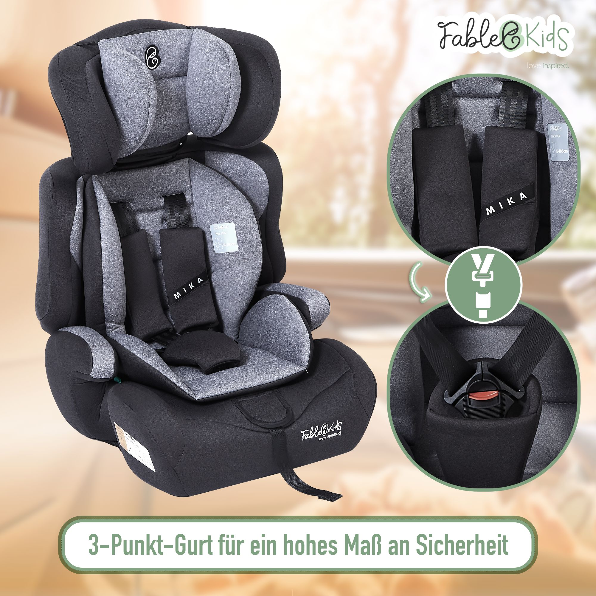 Schwarzer und grauer Autositz mit der Marke Fable Kids. Er hat ein 3-Punkt-Gurtsystem mit einem Etikett MIKA auf den Gurten.