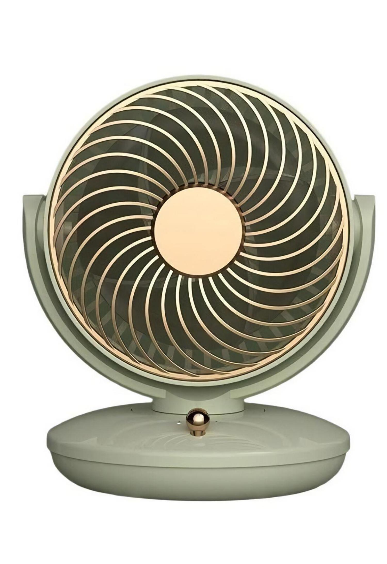 Ein mintgrüner und goldener Ventilator ist zentriert. Der Ventilator hat ein rundes, spiralförmiges Design. Er steht auf einem passenden Sockel mit einem goldenen Knopf.
