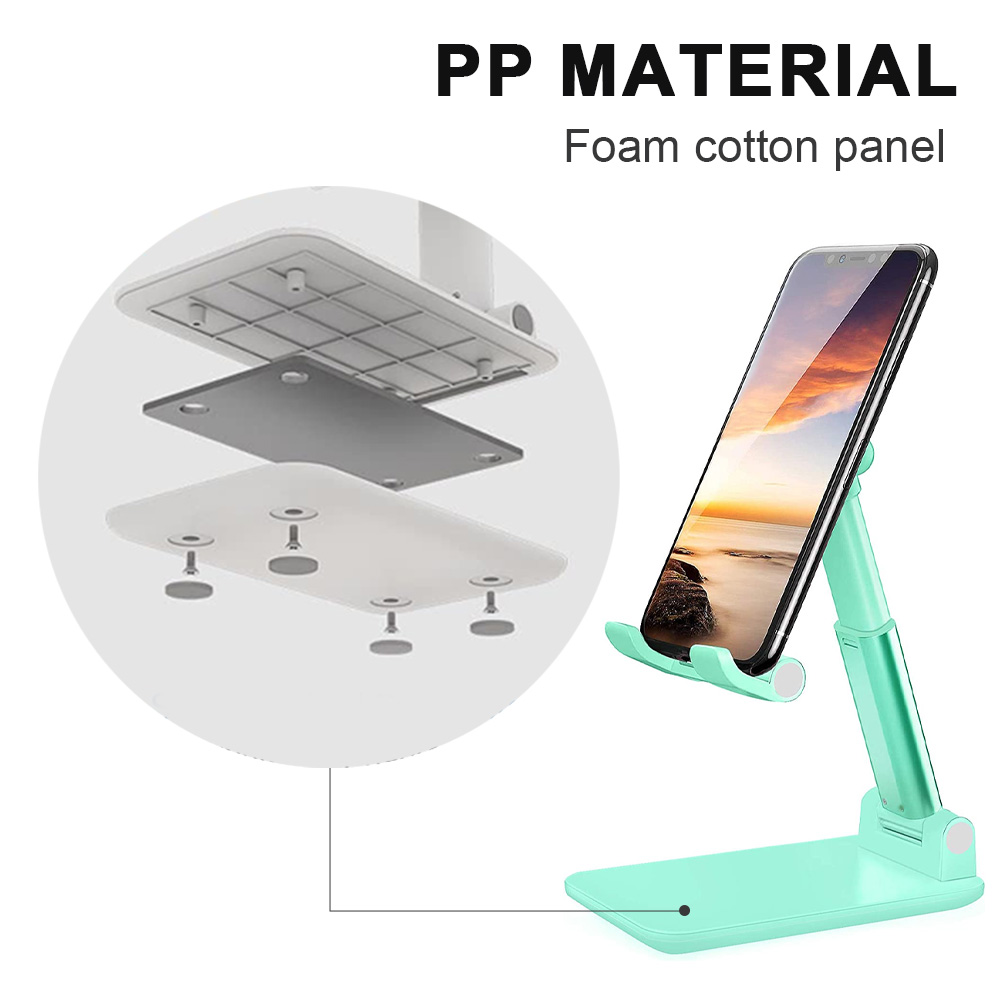 Ein Telefonständer und zerlegte Teile werden angezeigt. Der Ständer ist grün und hält ein Telefon mit Sonnenuntergang. Text: 'PP MATERIAL'.