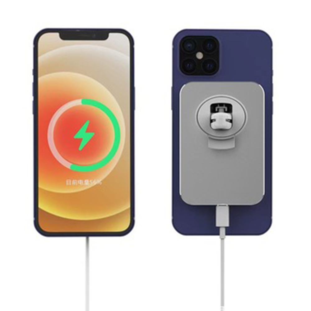 Zwei Smartphones. Eines lädt mit einem grünen Blitz auf dem Bildschirm, das andere hat eine graue Ladekomponente angebracht.