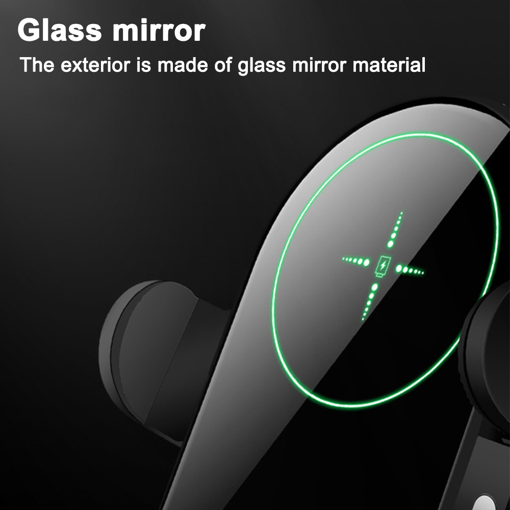 Nahaufnahme eines Glas spiegels mit grünem Umriss. Der Hintergrund ist dunkel. Der Spiegel hat ein Kreuz Design.