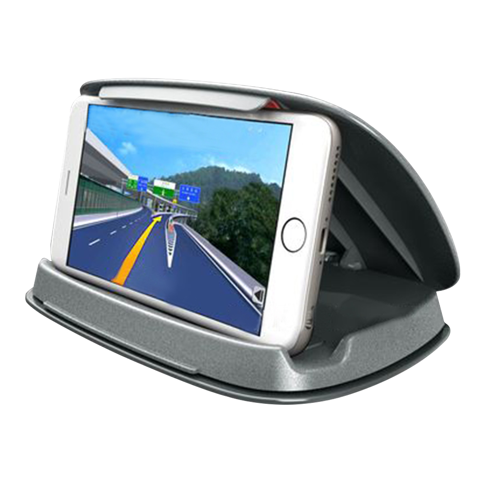 Ein Smartphone zeigt eine Straßennavigations-App. Das Telefon befindet sich in einem grauen Halter. Der Bildschirm zeigt eine Straße mit Bergen im Hintergrund.