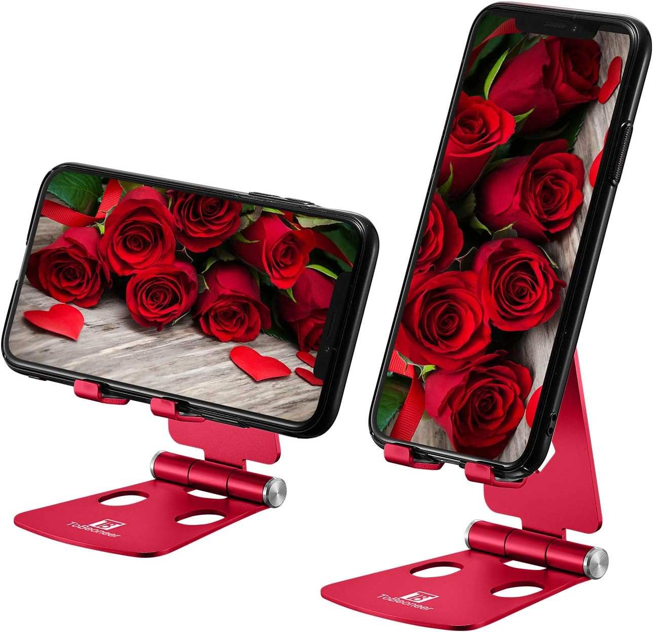 Zwei Telefone auf roten Ständern. Jedes zeigt rote Rosen auf Holz. Rote Herz-Ausschnitte sind verstreut.