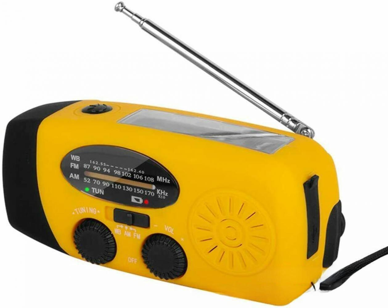 Ein gelbes und schwarzes Handkurbelradio. Es hat eine silberne Antenne, ein Einstellrad und ein Display mit Radiofrequenzen.
