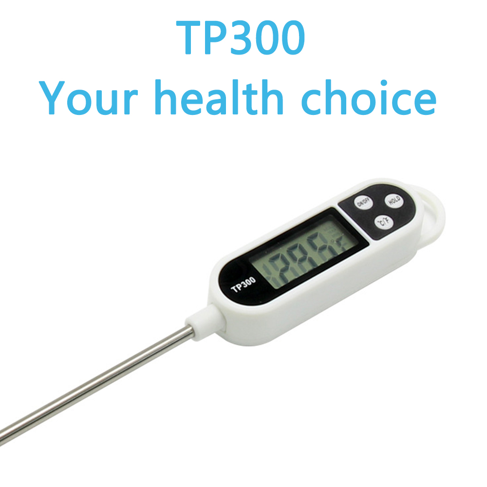 Ein weißes digitales Thermometer mit Metallsonden, das Zahlen anzeigt. Der Text oben lautet 'TP300 Your health choice'.