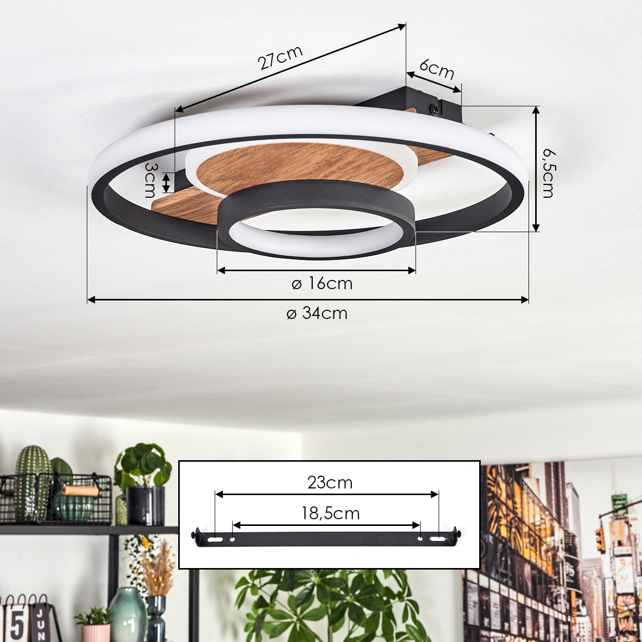 Moderne Deckenlampe mit kreisförmigem Design, weiß und schwarz, mit Holzelementen und angegebenen Abmessungen. Eine Halterung wird ebenfalls gezeigt.