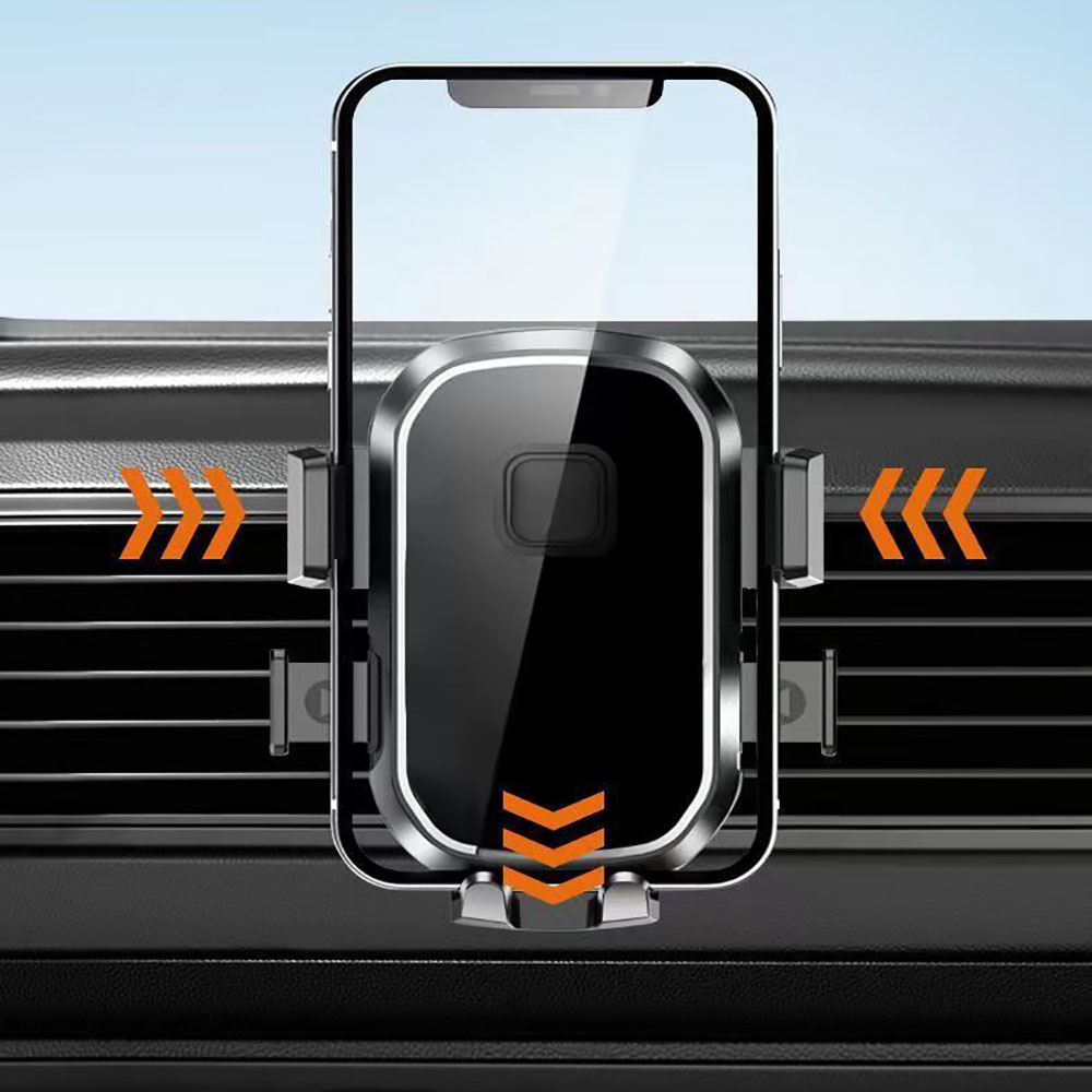 Ein schwarzer und silberner Telefonhalter ist an einer Lüftungsöffnung im Armaturenbrett eines Autos befestigt. Orangefarbene Pfeile zeigen die Einführrichtung an.
