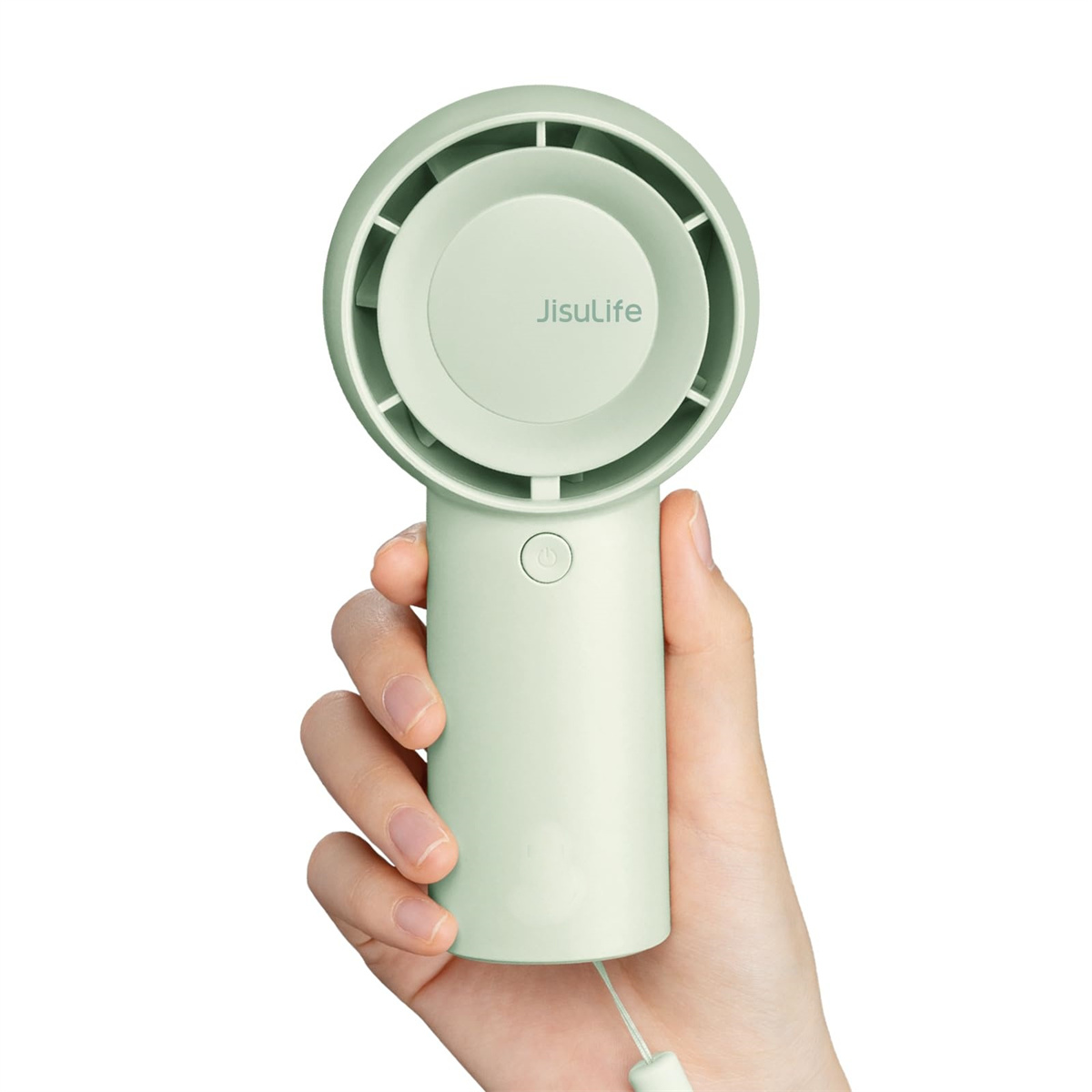 Eine Hand hält einen hellgrünen tragbaren JisuLife-Ventilator. Der Ventilator hat einen runden Kopf und einen zylindrischen Griff mit einem Ein-Aus-Knopf.