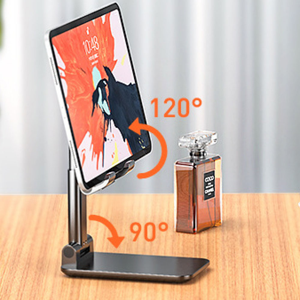 Tablet auf einem Ständer, mit Winkelanzeigen. Daneben steht eine Parfümflasche auf einer Holzoberfläche. Das Tablet zeigt ein abstraktes Bild.