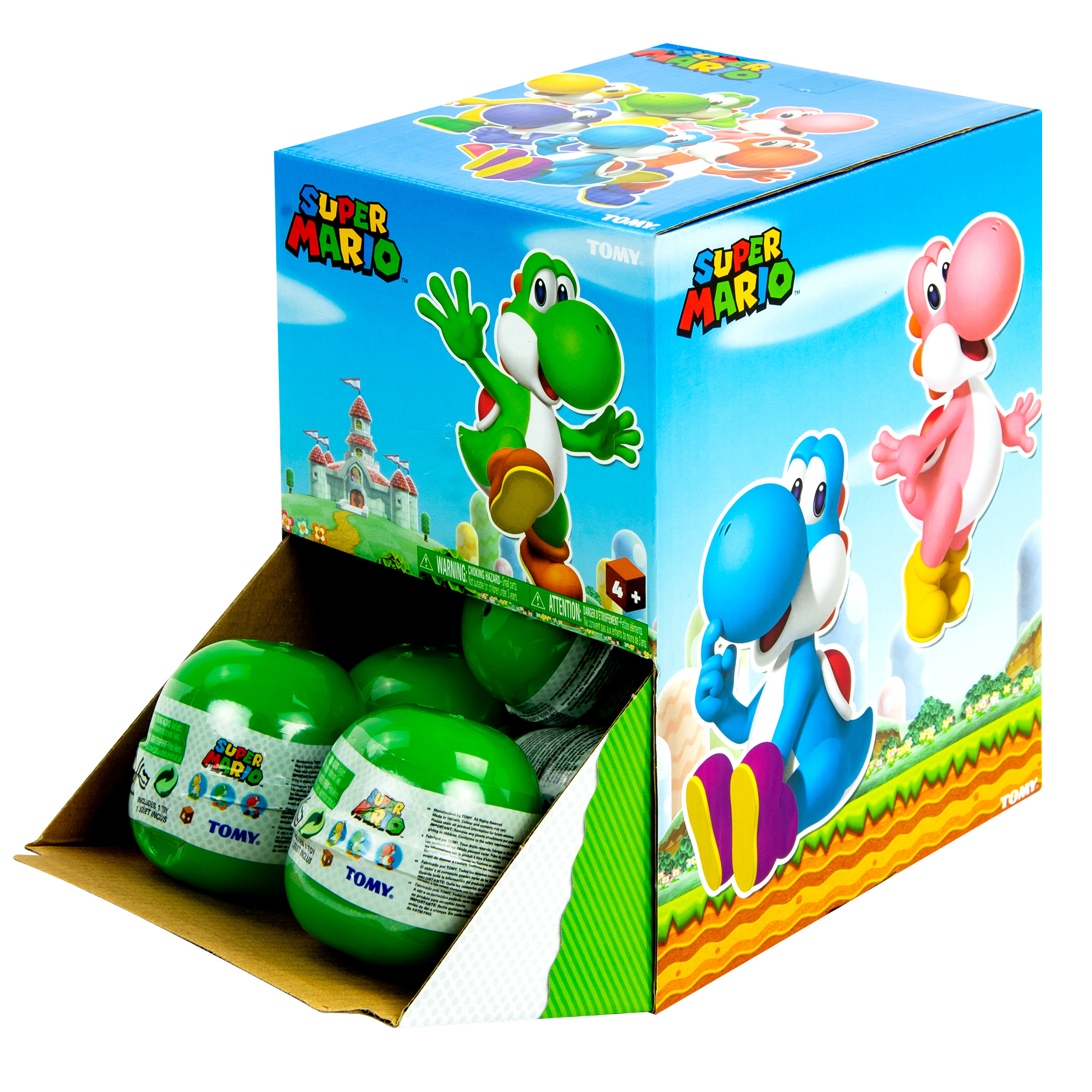 Une boîte de jouets Super Mario Yoshi. L'illustration de la boîte représente des Yoshis verts, bleus et roses. Des œufs verts sont à l'intérieur.