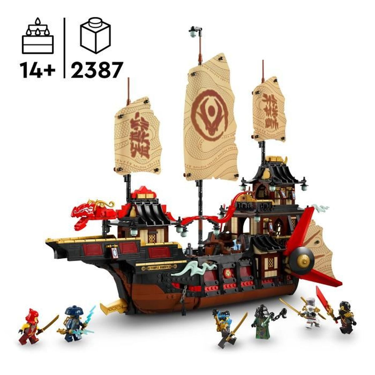 Statek Lego Ninjago z żaglami i minifigurkami. Statek ma czerwone i czarne akcenty oraz głowę smoka. Figurki są rozmieszczone wokół statku.